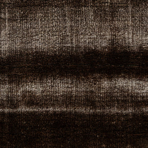 Detail Shot of a Textured Brown and Beige Hand-Loom Woolen Handmade Rug for bed rooms, offices, and dining spaces. 