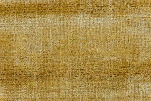 Detail Shot of Textured Gold and Beige Hand-Loom Viscose Handmade Rug for Modern bed rooms, offices, and dining spaces.