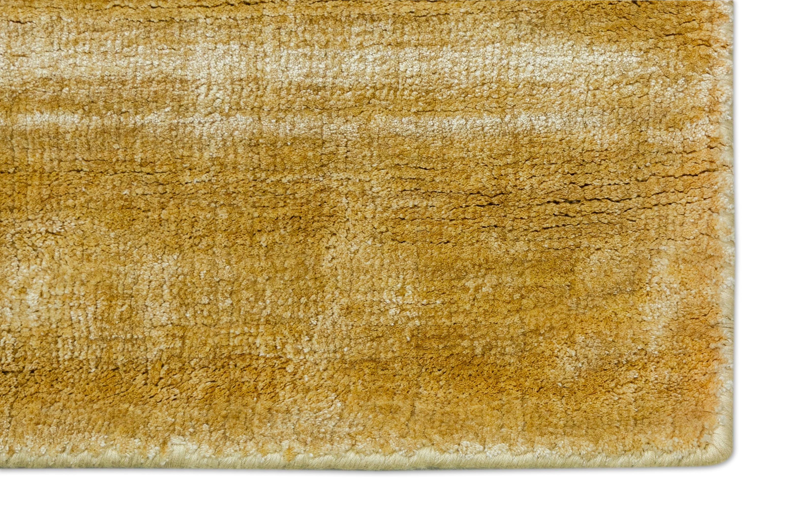 Detail Shot of Textured Gold and Beige Hand-Loom Viscose Handmade Rug for Modern bed rooms, offices, and dining spaces.