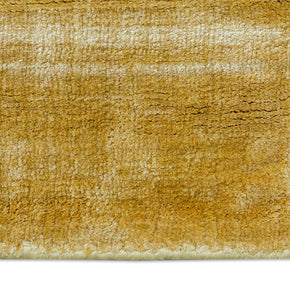 Detail Shot of Textured Gold and Beige Hand-Loom Viscose Handmade Rug for Modern bed rooms, offices, and dining spaces.