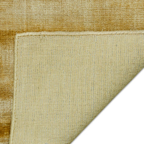 Detail Shot of Textured Gold and Beige Hand-Loom Viscose Handmade Rug for Modern bed rooms, offices, and dining spaces.