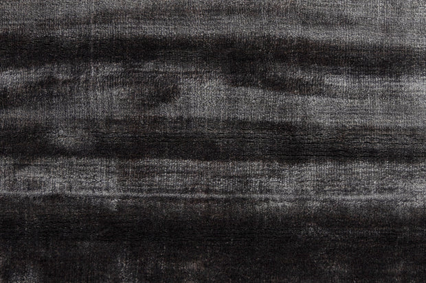 Detail Shot of Textured Rug with Wavy Pattern Hand-Loom Viscose Handmade Rug for bed rooms, offices, and dining spaces. 