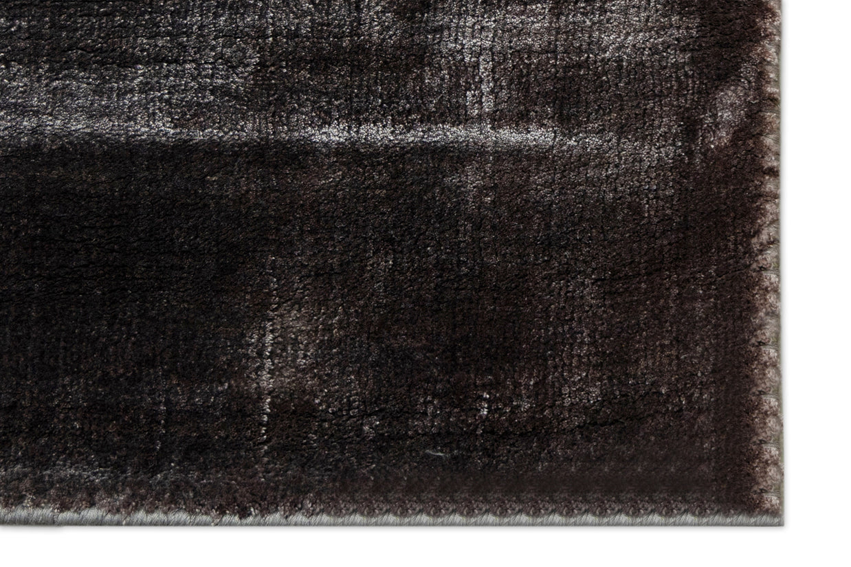 Detail Shot of Textured Rug with Wavy Pattern Hand-Loom Viscose Handmade Rug for bed rooms, offices, and dining spaces. 