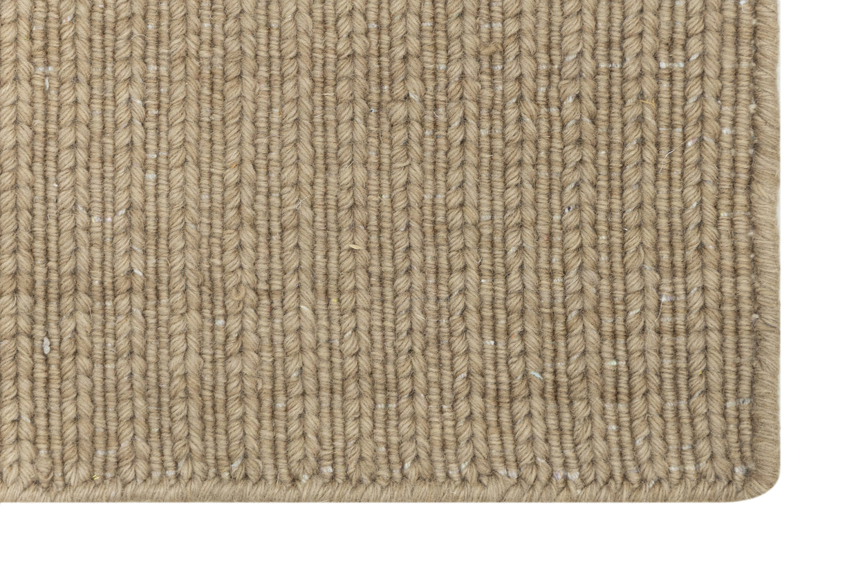 Clouse-up of Beige Texture Hand-Woven Soumak woolen rug for bed rooms, offices, and dining spaces. 