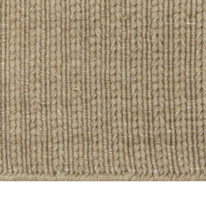 Clouse-up of Beige Texture Hand-Woven Soumak woolen rug for bed rooms, offices, and dining spaces. 