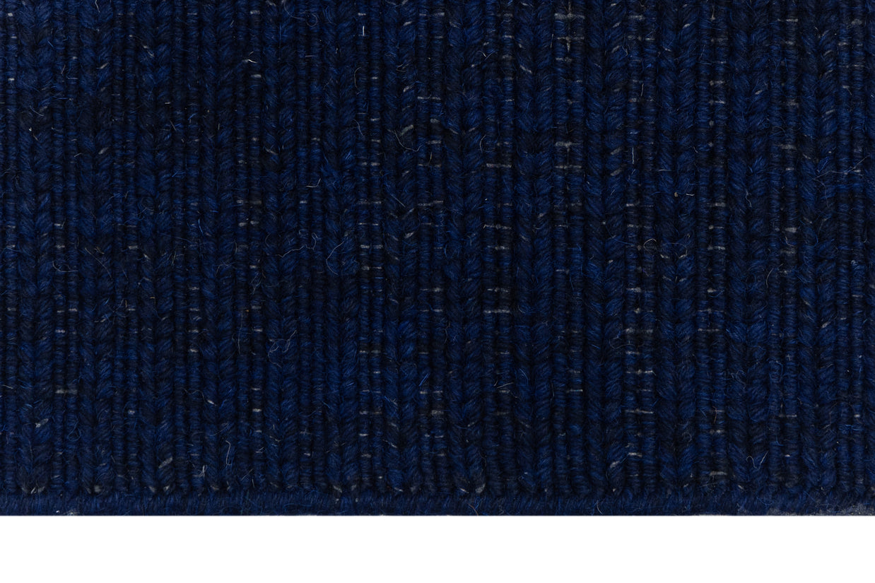 Clouse-up of Navy Blue Texture Hand-Woven Soumak woolen rug for bed rooms, offices, and dining spaces. 