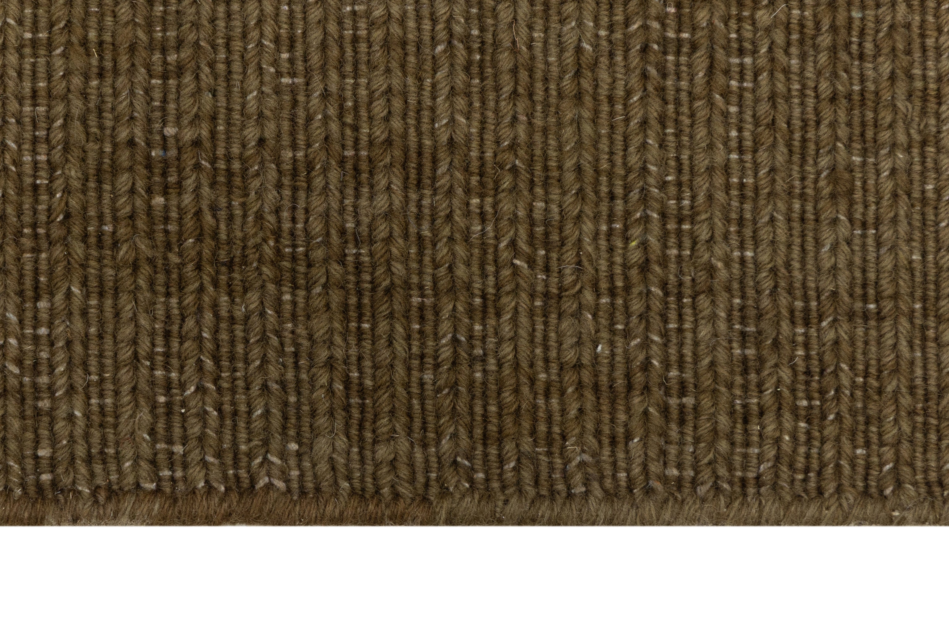 Close-up of Brown Texture Hand-Woven Soumak woolen rug for bed rooms, offices, and dining spaces. 
