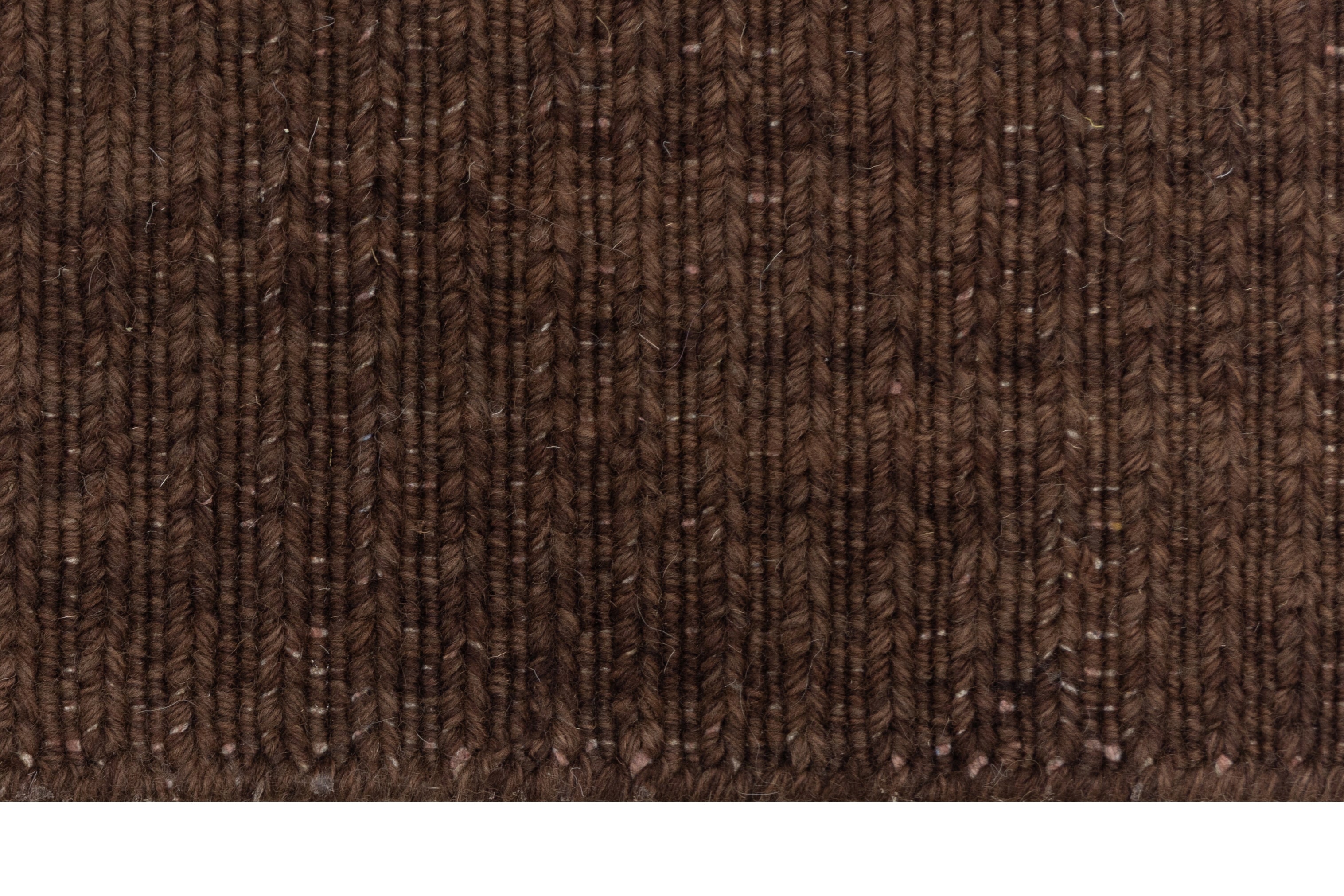 Close-up of Brown Texture Hand-Woven Soumak woolen rug for bed rooms, offices, and dining spaces. 