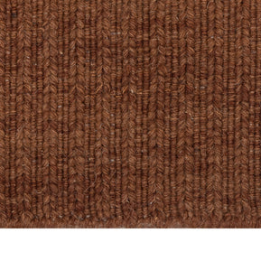 Close-up of Brown Texture Hand-Woven Soumak woolen rug for bed rooms, offices, and dining spaces. 