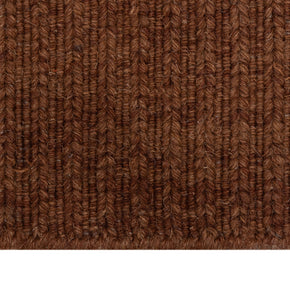Close-up of Brown Texture Hand-Woven Soumak woolen rug for bed rooms, offices, and dining spaces. 