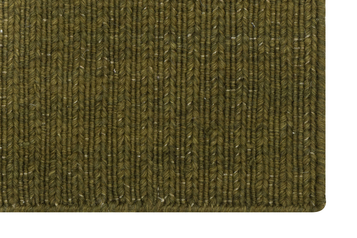 Close-up of Green Texture Hand-Woven Soumak woolen rug for bed rooms, offices, and dining spaces. 