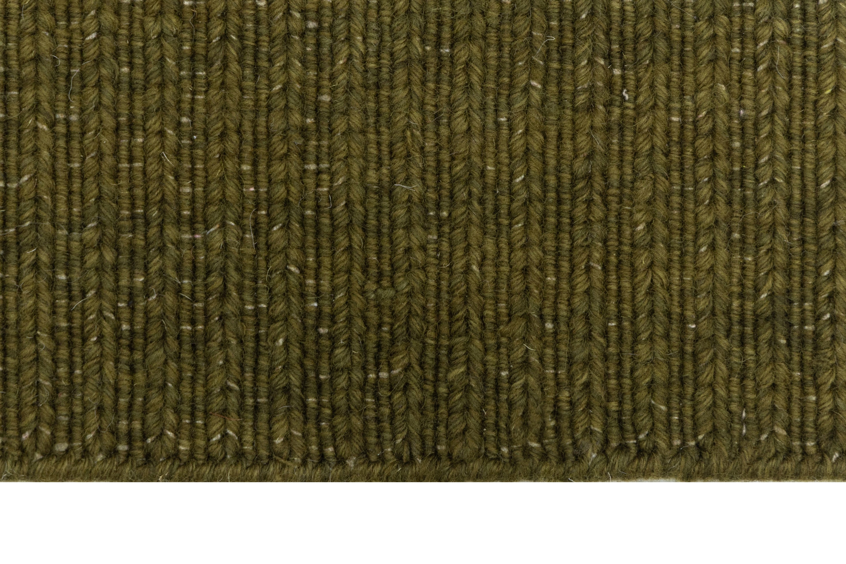 Close-up of Green Texture Hand-Woven Soumak woolen rug for bed rooms, offices, and dining spaces. 