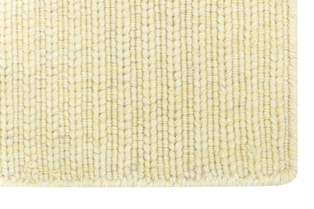 Close-up of Beige Texture Hand-Woven Soumak woolen rug for bed rooms, offices, and dining spaces. 