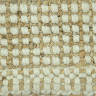 Alpine Grid Handwoven Pitloom Rug, Close-up of a woven pattern jute and wool rug with alternating beige and white squares.