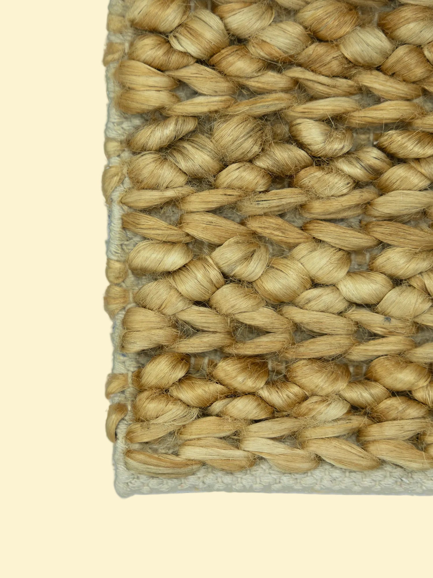 Desert Basket | Handwoven Pitloom Jute Rug, Close-up of a woven jute rug