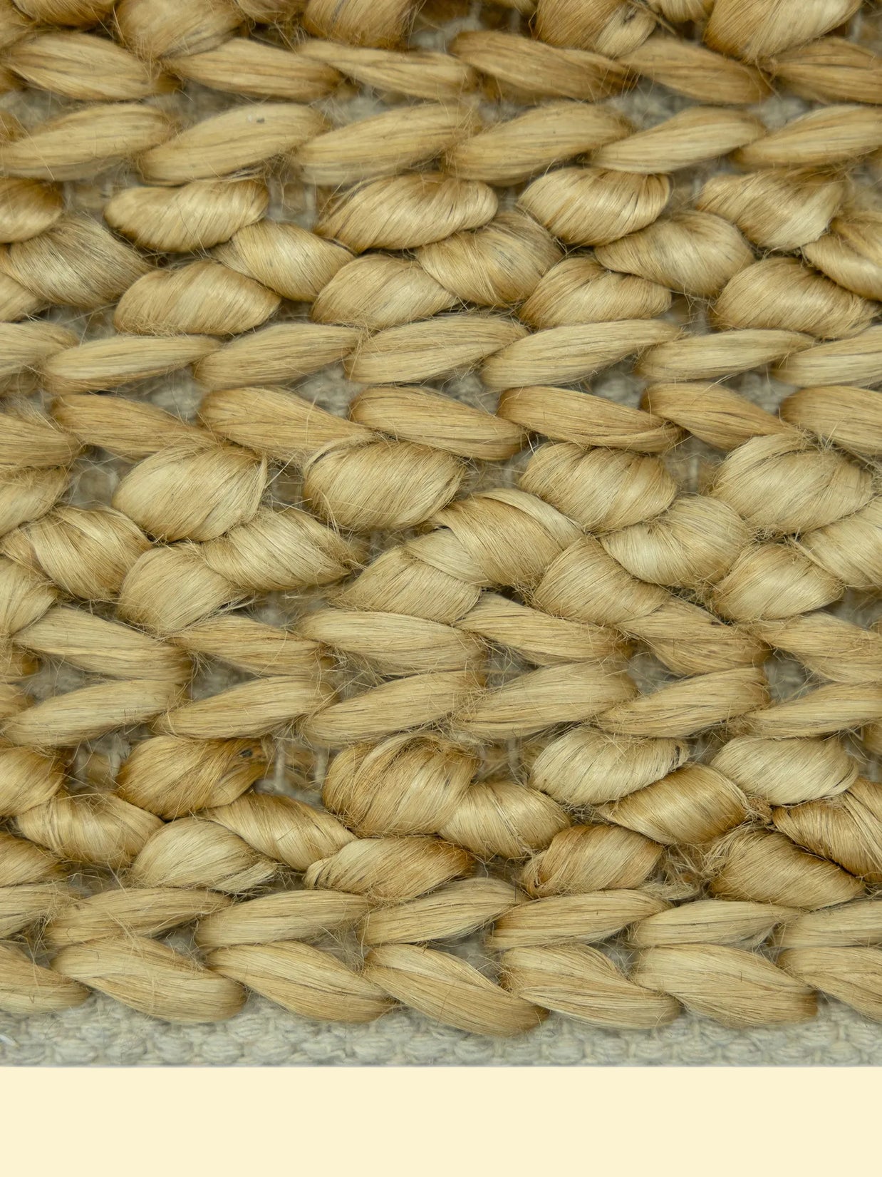 Desert Basket | Handwoven Pitloom Jute Rug, Close-up of woven natural jute material