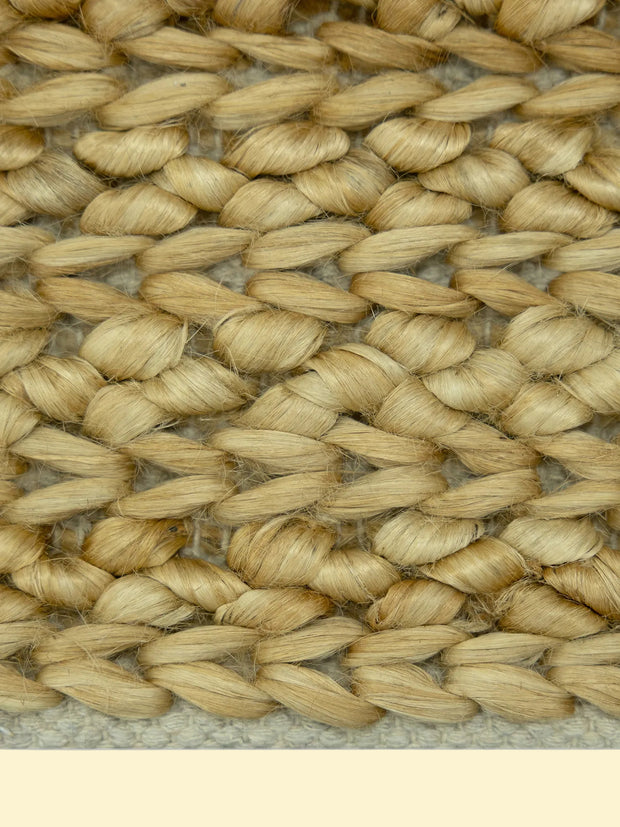 Desert Basket | Handwoven Pitloom Jute Rug, Close-up of woven natural jute material