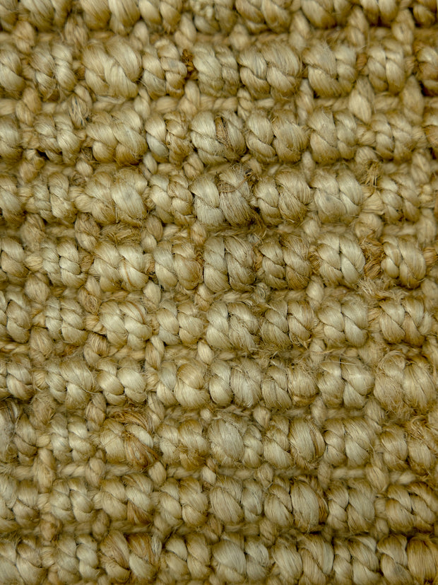 Desert Loom | Handwoven Pitloom Durrie, Close-up of beige jute carpet texture