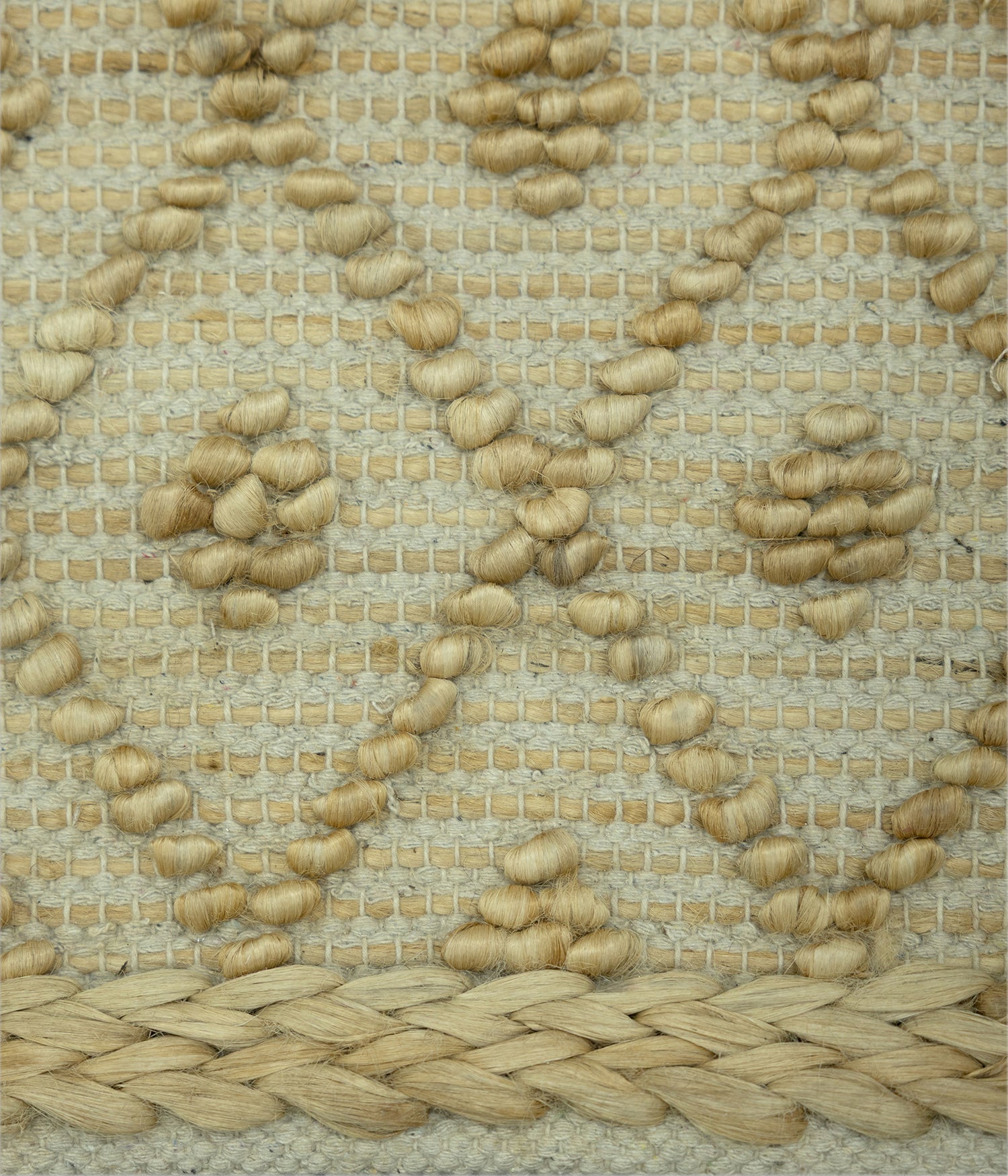 Desert Mosaic | Handwoven Pitloom Jute Rug, Close-up of a woven mat with a textured pattern