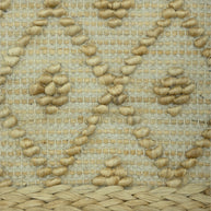 Desert Mosaic | Handwoven Pitloom Jute Rug, Close-up of a woven mat with a textured pattern