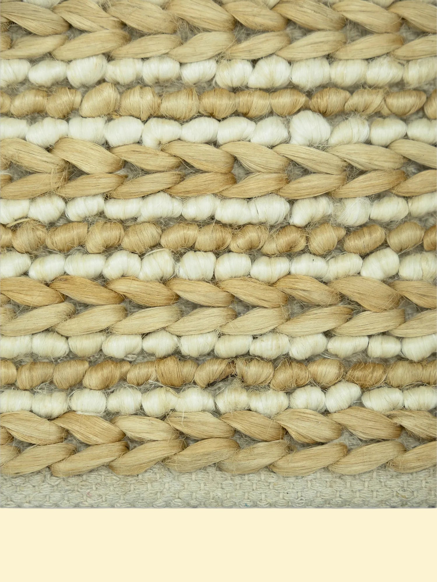 Desert Rhythm | Durry Handwoven Jute Cotton Rug, Close-up of woven jute and wiil material with beige and white colors.