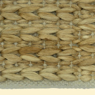 Durry Handwoven Jute Cotton Rug, Close-up of woven straw mat with a natural beige color.