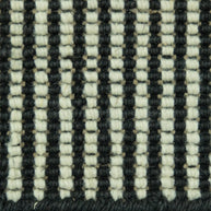 Close-up of a woven pattern of Jute and Wool Rug with black and white stripes.