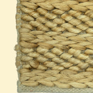 Golden Dune | Handwoven Pitloom Jute Rug, Close-up of a woven natural fiber rug corner