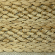 Golden Dune | Handwoven Pitloom Jute Rug, Close-up of a woven natural jute bag with a beige color border