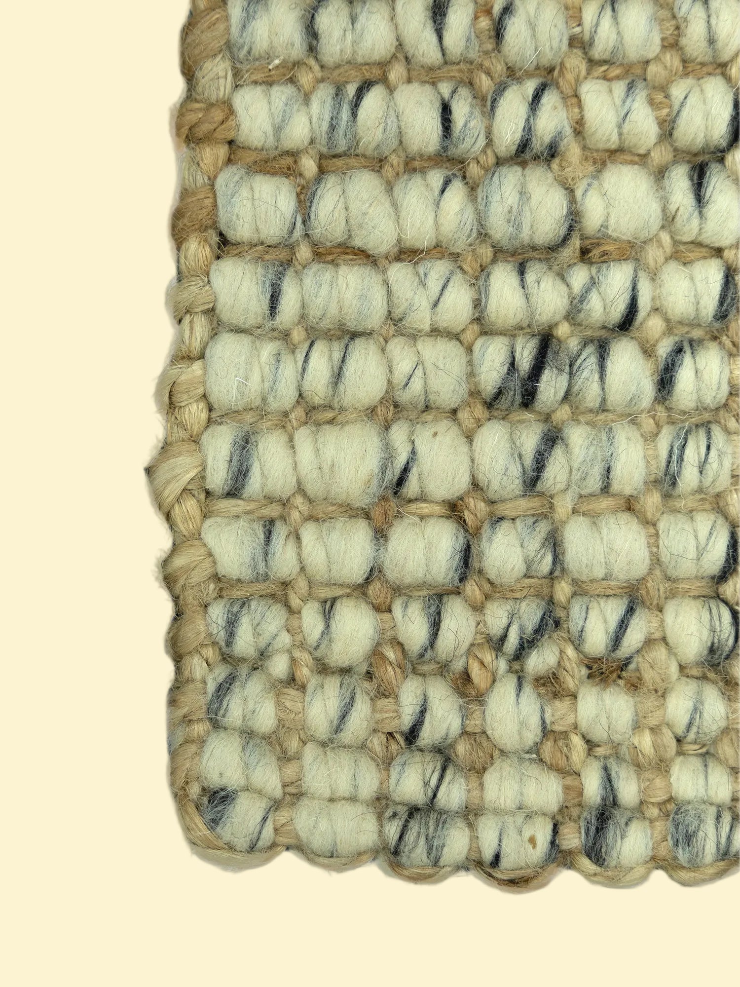 Handmade Durry Pitloom Wool Jute Rug, Close-up of a woven mat with beige and black pattern