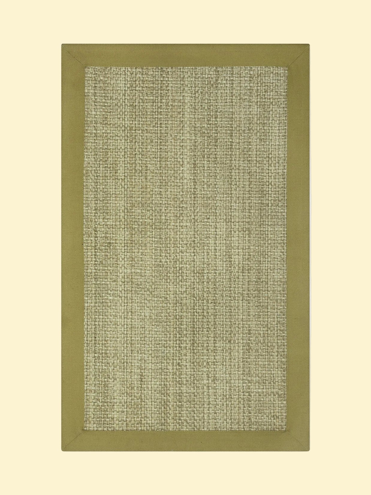 Textured Jute rug with a solid green border on a white background