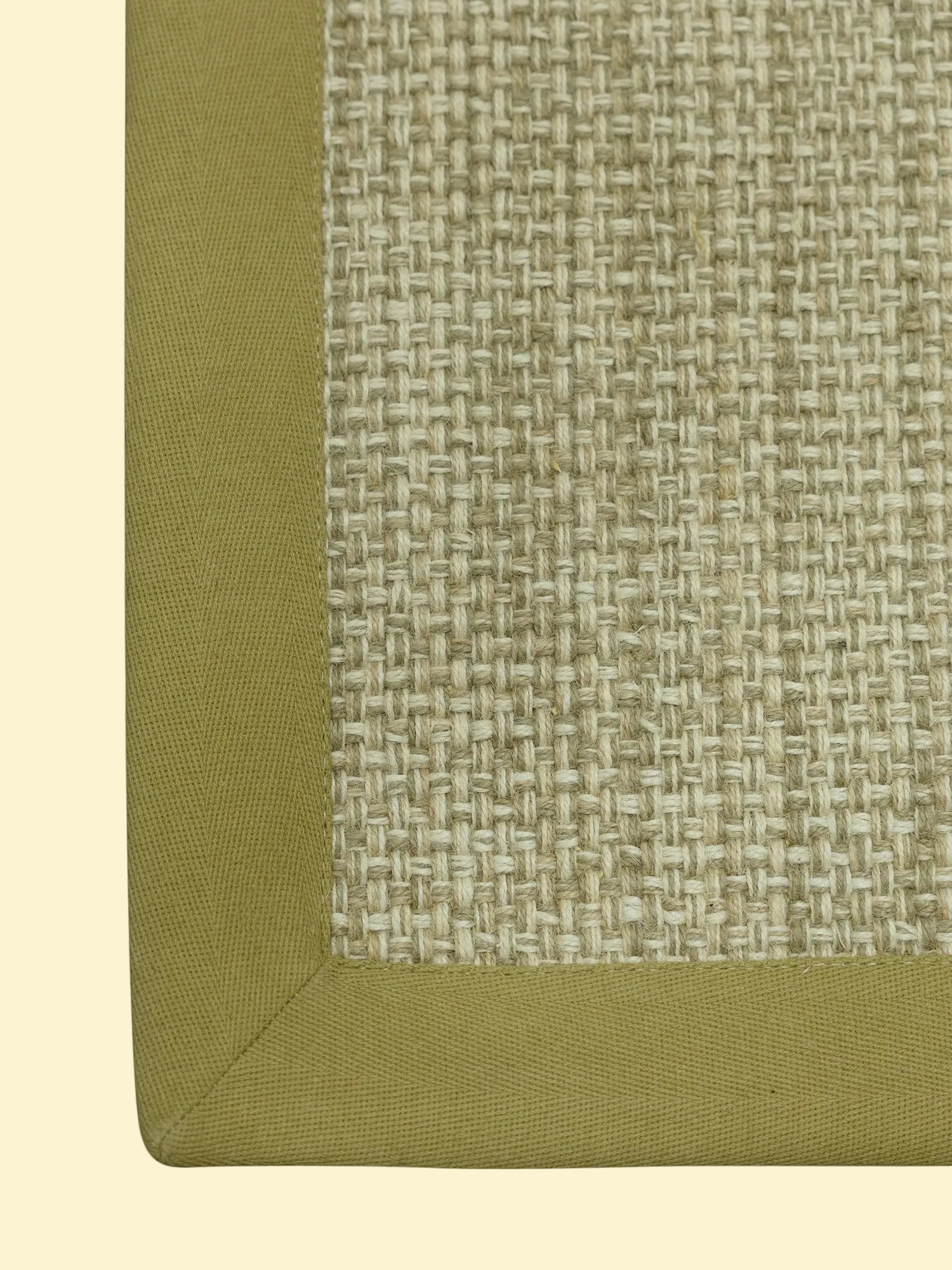 Textured green and beige border on a white background
