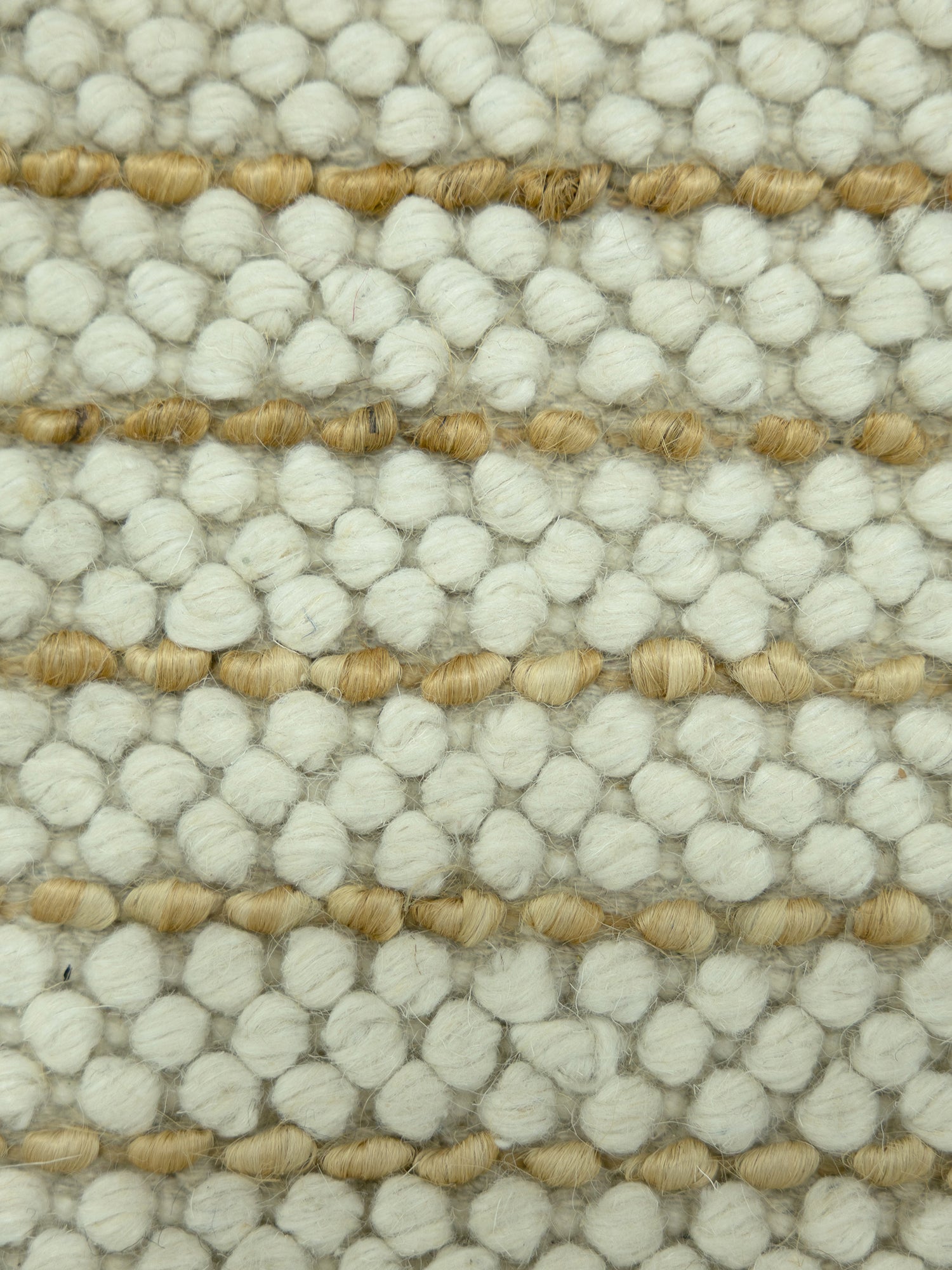 Ivory Pebble | Handwoven Pitloom Durrie, Close-up of textured jute and wool rug with beige and white pattern
