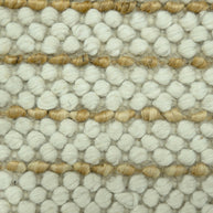 Ivory Pebble | Handwoven Pitloom Durrie, Close-up of textured jute and wool rug with beige and white pattern
