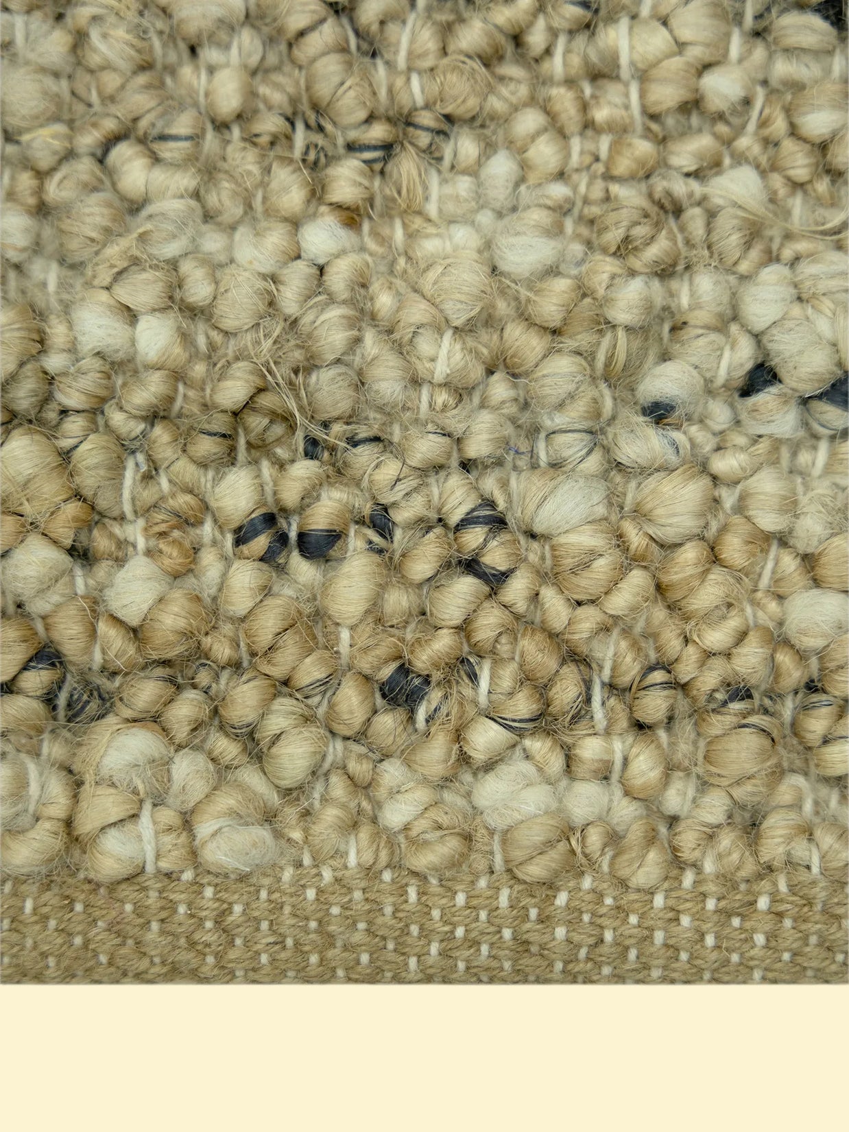 Nomad Texture | Handwoven Pitloom Durrie, Close-up of a textured beige jute carpet