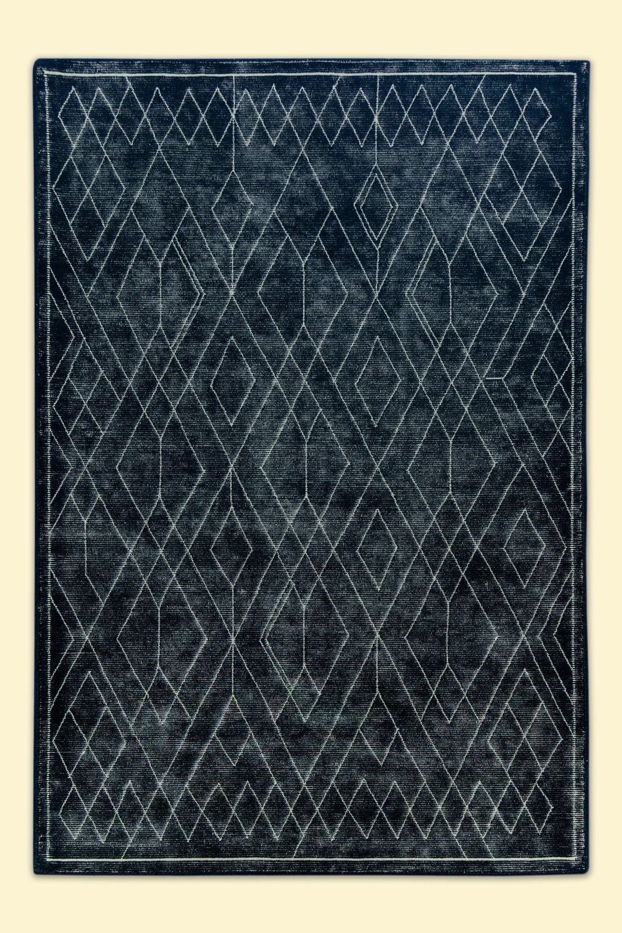 Black Hand-Tufted Woolen Handmade Rug for bed rooms, offices, and dining spaces.
