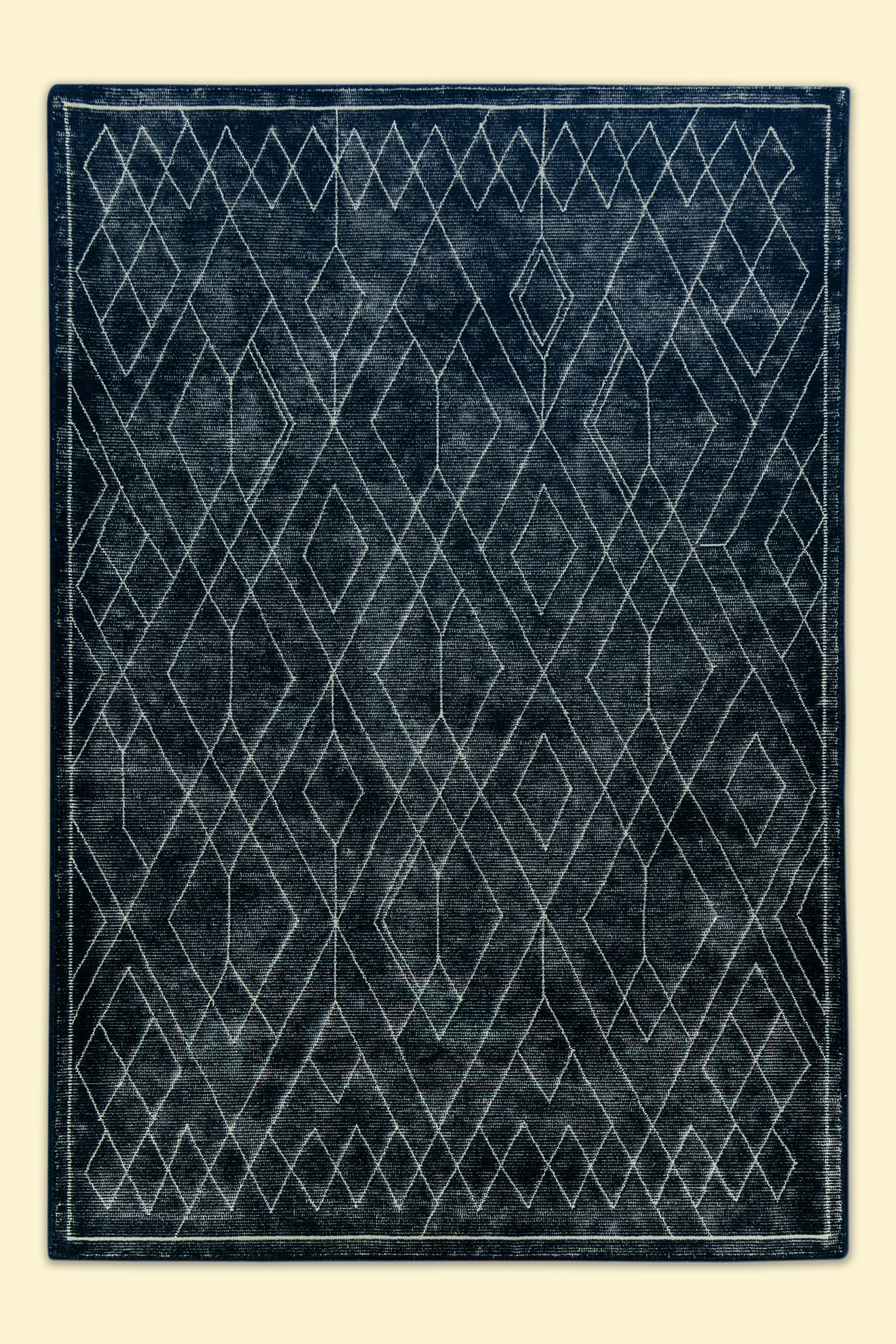 Black Hand-Tufted Woolen Handmade Rug for bed rooms, offices, and dining spaces.