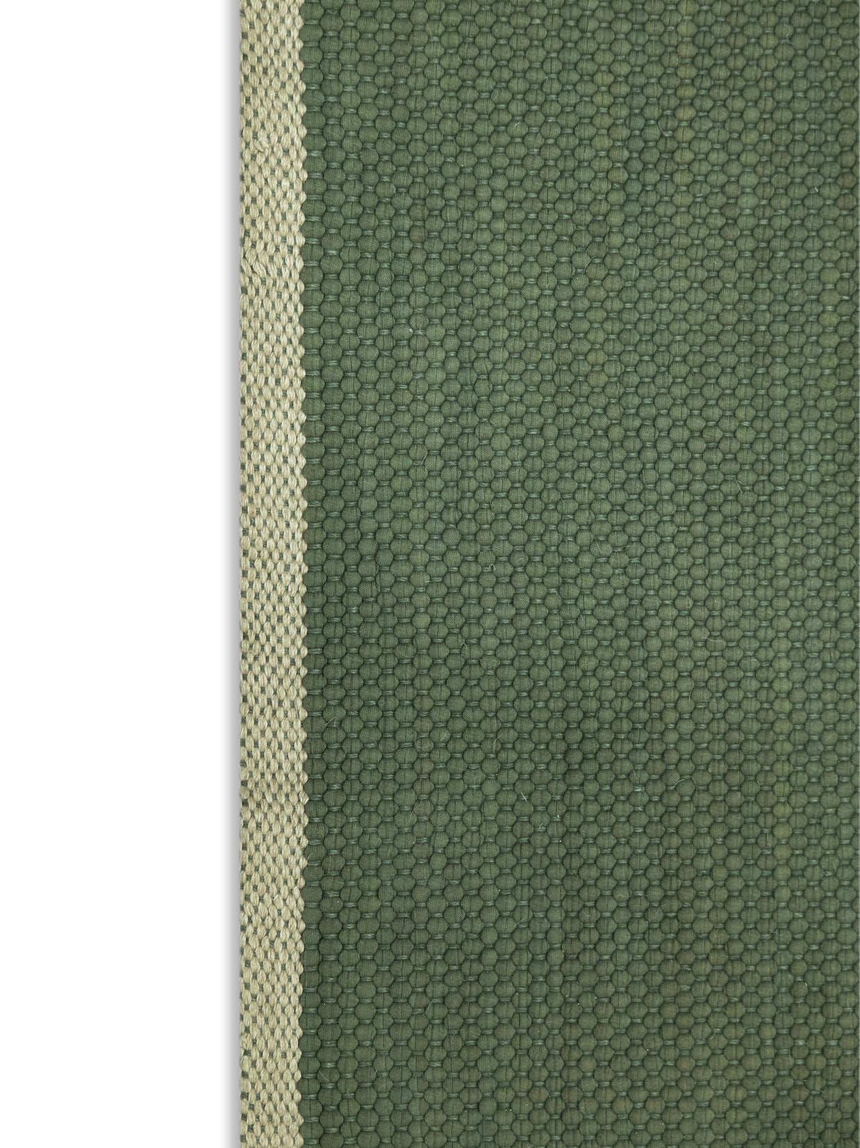 Green fabric with a subtle pattern highlighting the beige border
