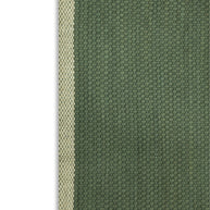 Green fabric with a subtle pattern highlighting the beige border